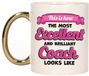 Bellatio Decorations Cadeau koffie/thee mok - excellent trainer/coach - goud/roze - keramiek - 300 ml