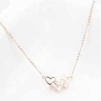 Tre hjärtan med hängande stenar