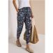 Pantalon mi-taille jambe slim coupe ample