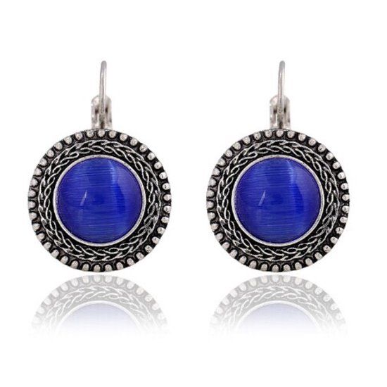 Deja Jewels Lookinggoodtoday Ronde zilverkleurige dames oorbellen met blauwe opaal