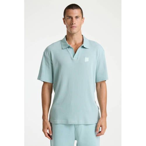 CHASIN' regular polo met textuur blauw