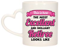 Bellatio Decorations adeau koffie/thee mok - excellent gepensioneerde - roze - keramiek - 300 ml