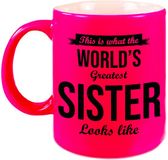 Bellatio Decorations Bol What the worlds greatest sister looks like cadeau mok / beker - 330 ml - neon roze - verjaardag / bedankt cadeau zus