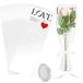 Housses de roses blanches pour fleurs avec ruban