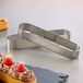 Westmark Moule à tarte 4 parts – Cuisson parfaite de tartes et quiches – Résultat de cuisson uniforme grâce à la perforation – Argent, ovale