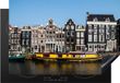 Merkloos KitchenYeah® Inductie beschermer 77x51 cm - Een gele woonboot in de Amsterdamse gracht - Inductiebeschermer voor inductiekookplaat