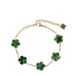 Manfield - Dames - Goudkleurige armband met groene bloemetjes