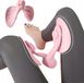 Butterfly TRENCHER BELT DNA Pelvic floor trainer, verstelbaar. Achtergrond: roze