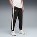 PUMA FC Rood Bull Salzburg KING Anthem broek, Zwart/Goud, Maat L