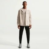 NIKE Trainingsjack 'NK' beige / crème
