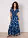 Apricot Maxijurk met bloemenprint en smockdetails