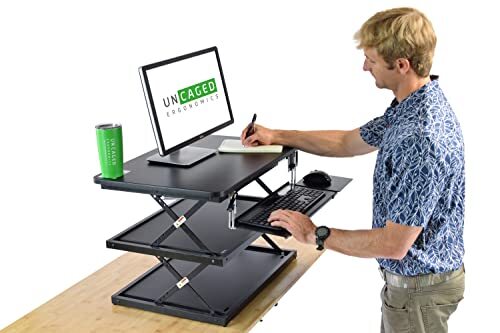 Uncaged Ergonomics Hoge ergonomische laptop- en bureaustandaard, staal + MDF, zwart, 20 x 28 cm Top Panel | 4-21,5 inch hoogte bereik