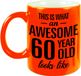 Bellatio Decorations Neon oranje Awesome 60 year cadeau mok / verjaardag beker 330 ml