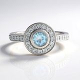 Cavill - Elegante Ronde Ring - 925 Sterling Zilver Geplatineerd - Hemelsblauwe Topaas 0,585 ct & Zirkonia 0,612 ct