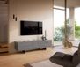 Meuble TV Cuor 180 cm Céramique Béton gris 1 clapet 2 tiroirs Pied optique flottant Ancier inoxydable
