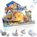 Maison de poupée Mer bleue - Kit de construction avec meubles et éclairage LED