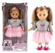 ARTYK Spreekpop Natalia, 39 cm, met blond haar en een roze outfit