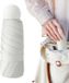Merkloos / Sans marque BeltAvenue Holding B.V. mini Opvouwbare parasol voor dames, regen- en uv-bescherming, 6-ribbenparaplu voor strand, reizen, kamperen, vissen, sport, dagelijks gebruik, wit