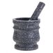 Mortier et pilon avec motif en granit