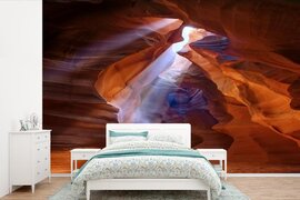 Nr1Wallpaper Behang - Fotobehang Zonnestralen schijnen naar binnen in een grot van de Grand Canyon - Breedte 450 cm x hoogte 300 cm