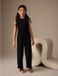 Next Meisjes Jersey jumpsuit van kreukstof Zwart