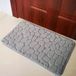 NCD E-Commerce Handel GmbH Tapis de bain en corail polaire avec structure de galets, absorbant et antidérapant, 40*60 cm, noir