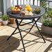 Table de jardin pliante - Table de camping - Plateau rond de 80 cm - Hauteur 74 cm - Noir - Cadre en acier inoxydable - Convient pour 4 personnes