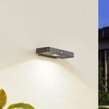 Lucande LED-zonne-wandlamp Tavon, hoekig, zwart, sensor