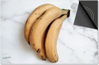 Dietrix Inductie Beschermer - 78x52 cm - DELUXE - Groente en Fruit - Bananen Tros op Marmer Wit - Inductie Kookplaat Beschermer