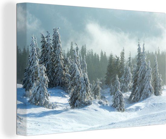 OneMillionCanvasses Canvas schilderij 150x100 cm - Bos - Sneeuw - Winter - Kerstman - Multicolor