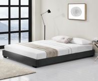 Corium Houten bed Laag kunstleer met bedbodem 180x200 cm zwart