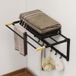 Porte-serviettes mural pliable pour salle de bain, 60 cm, noir, avec 5 barres et 6 crochets.