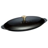 STAUB serveerschaal, ovenschotel van gietijzer met deksel, ovaal, 31 cm, 0,7 l, geschikt voor alle soorten fornuizen, inductie en oven, zwart