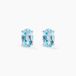 Boucles d'oreilles puce ovale serti griffe or blanc topaze