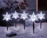 Spetebo Éclairage de jardin LED avec prise, 5 flocons de neige - 21 cm - Éclairage extérieur pour Noël, blanc froid, avec minuterie, fonctionne sur piles