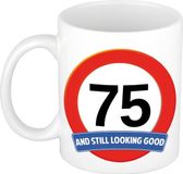 Bellatio Decorations Shoppartners Bv Koffie mok / cadeau beker - 75 jaar - verjaardag - still looking good - wit - stopbord - 300 ml - keramiek