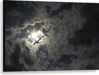 Merkloos / Sans marque Canvas - Passagiersvliegtuig Zwemmend bij de Zon langs de Wolken - 100x75 cm Foto op Canvas Schilderij