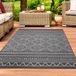 Tapis moderne pour intérieur et extérieur, avec motifs géométriques en anthracite et crème. Dimensions : 240 x 340 cm