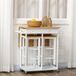 Ensemble de comptoir escamotable sur roulettes avec 2 chaises hautes, finition blanc chêne clair, rangements intégrés (2 tiroirs + barre à serviettes)