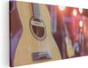 Artaza Canvas Schilderij Gitaar bij het Podium - 40x20 - Canvas Print