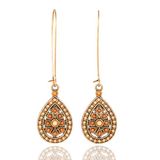 Deja Jewels Lookinggoodtoday Lange druppelvormige Boho oorbellen zilver roze en oranje stenen