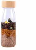 Petit Boum - Babyspeelgoed sensorische fles met geluid - kastanjebruin