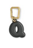 UNTAGS - Bedel letter Q - materiaal met ledereffect - inclusief gouden metalen gesp - zwart