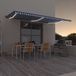 Maison Exclusive - Pare-soleil rétractable manuellement avec éclairage LED, 600x300 cm, bleu et blanc