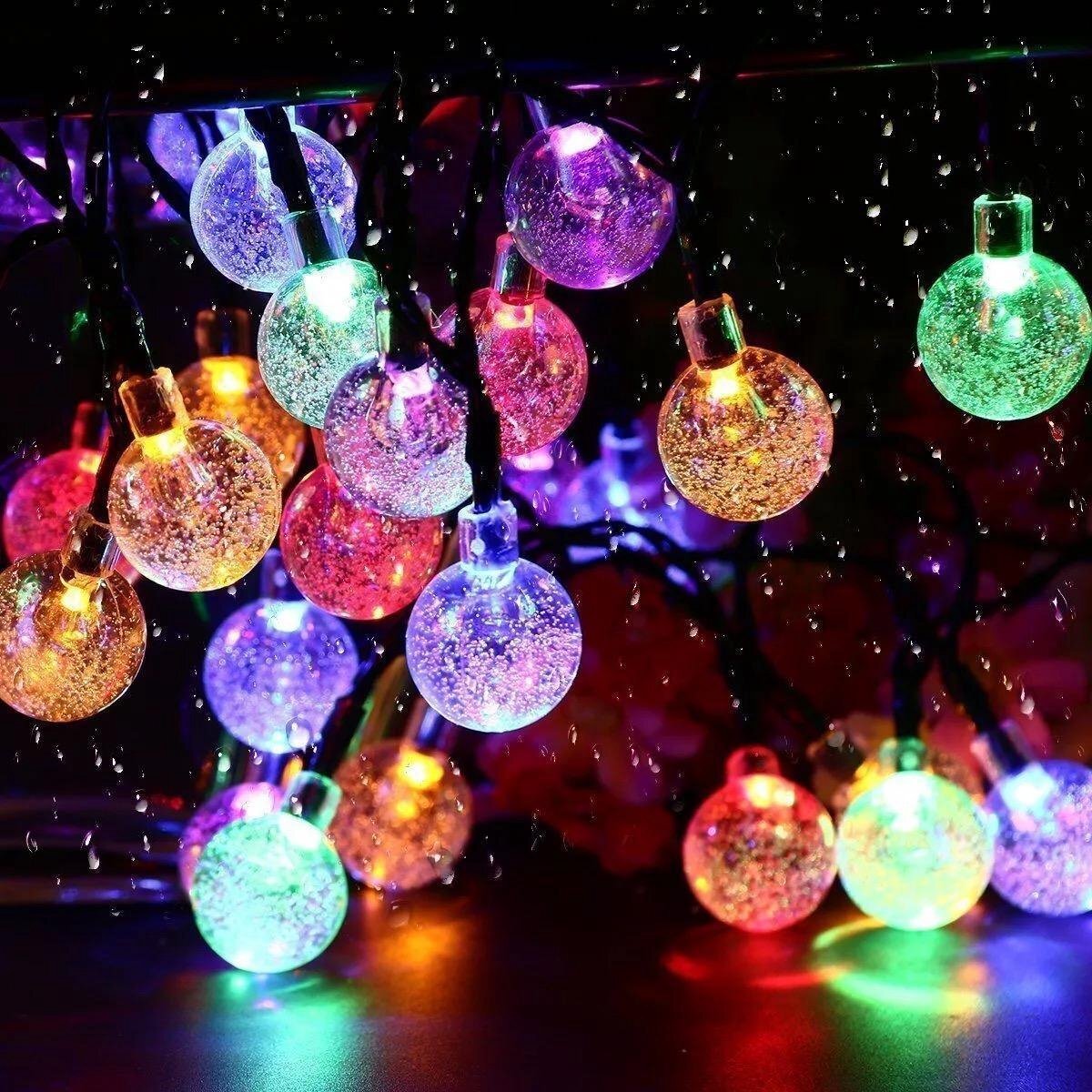 Itagala Solar Led Tuinverlichting | Bolletjes lichtsnoer op zonne-energie | Tuindecoratie | Kerstverlichting | 7 Meter | 50 led lampjes | Feestelijke verlichting | Waterproof | Te leuk voor in de tuin | Multi Color