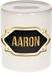 Bellatio Decorations Shoppartners Bv Spaarpot met voornaam Aaron - wit - met goud/zwart embleem - 8 x 9 cm - keramiek - met afsluitdop - cadeau verjaardag