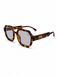 Gianni Kavanagh Lunettes de soleil 'Octo' marron / cognac / noir