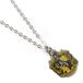 The Carat Shop Harry Potter Hufflepuff Schild Ketting Zilverkleurig