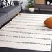 Safavieh Melody Collection Gestreept tapijt voor woonkamer, eetkamer, slaapkamer, laagpolig, ivoor, zwart, 122 x 183 cm