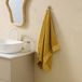 NOUS Living handdoek geel (110x60 cm)